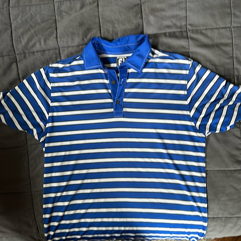 Footjoy golf polo with Buffalo Hills Golf on left sleeve.